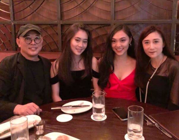 Nina Li Chi with her husband Jet Li and daughters.